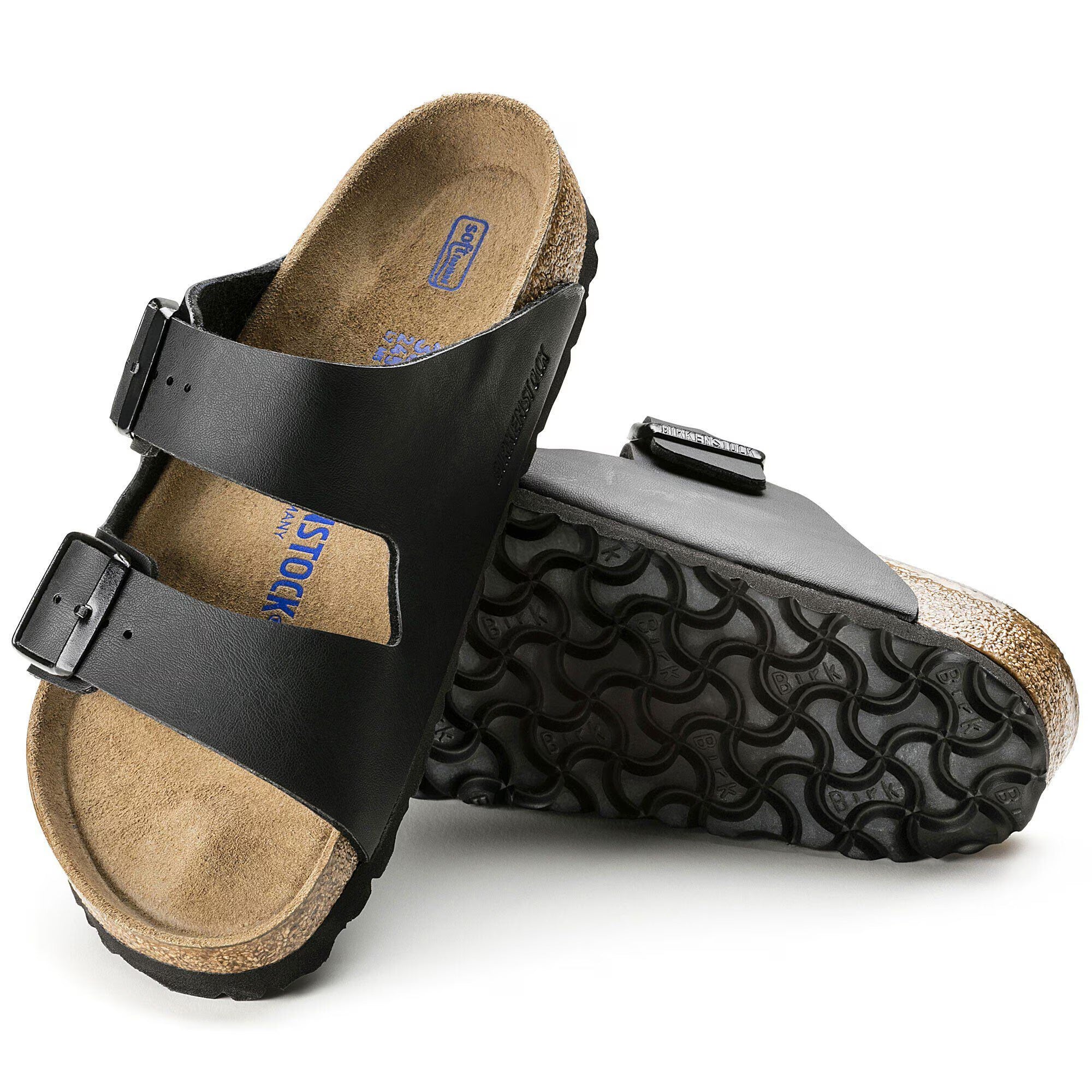 Black sandals with cork insole on a white background