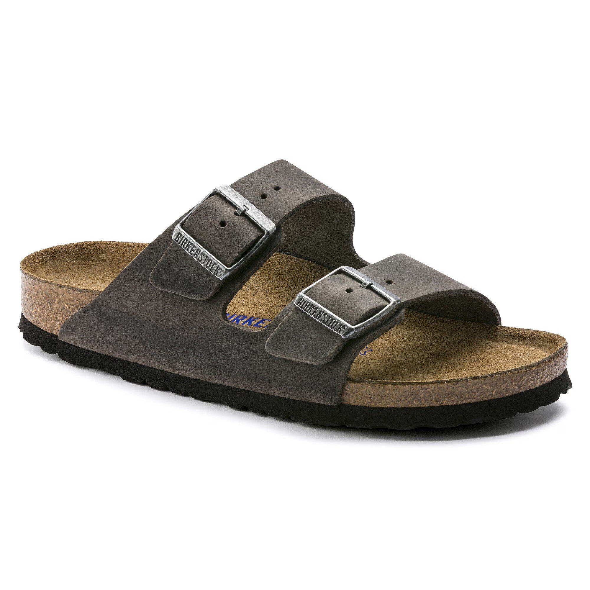 Brown sandal with cork sole on a white background
