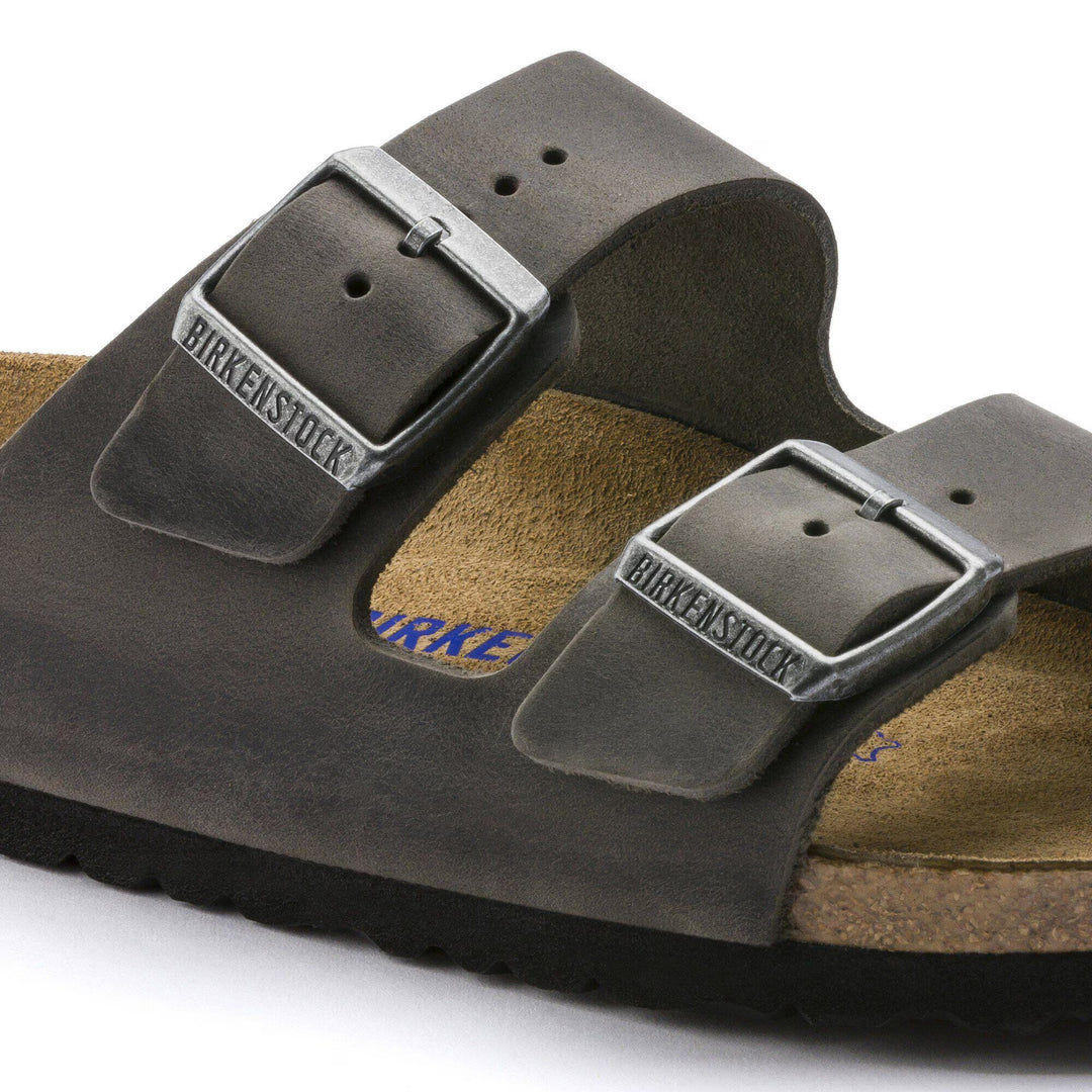 Brown Birkenstock sandal with a white background