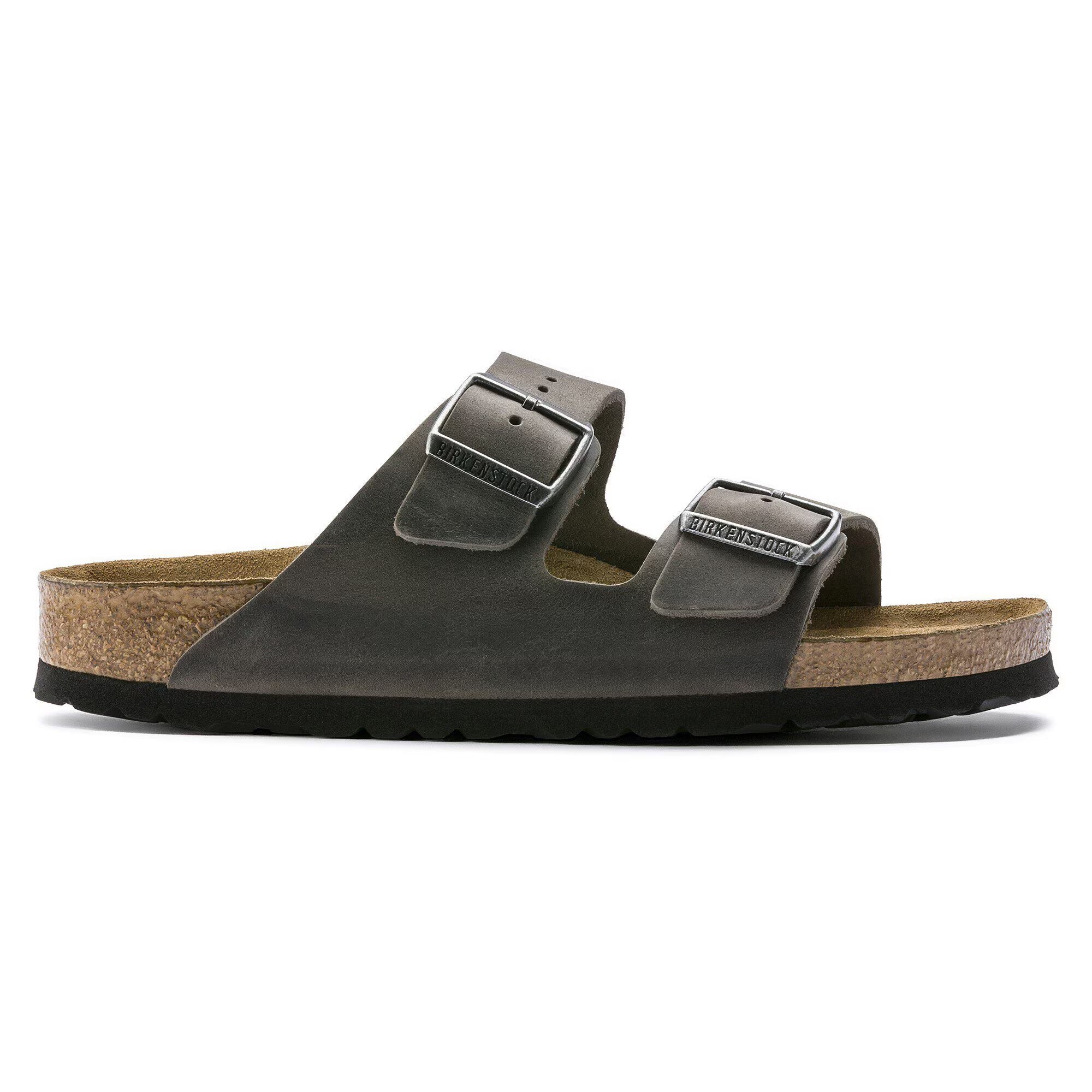 Brown sandal with cork sole on a white background