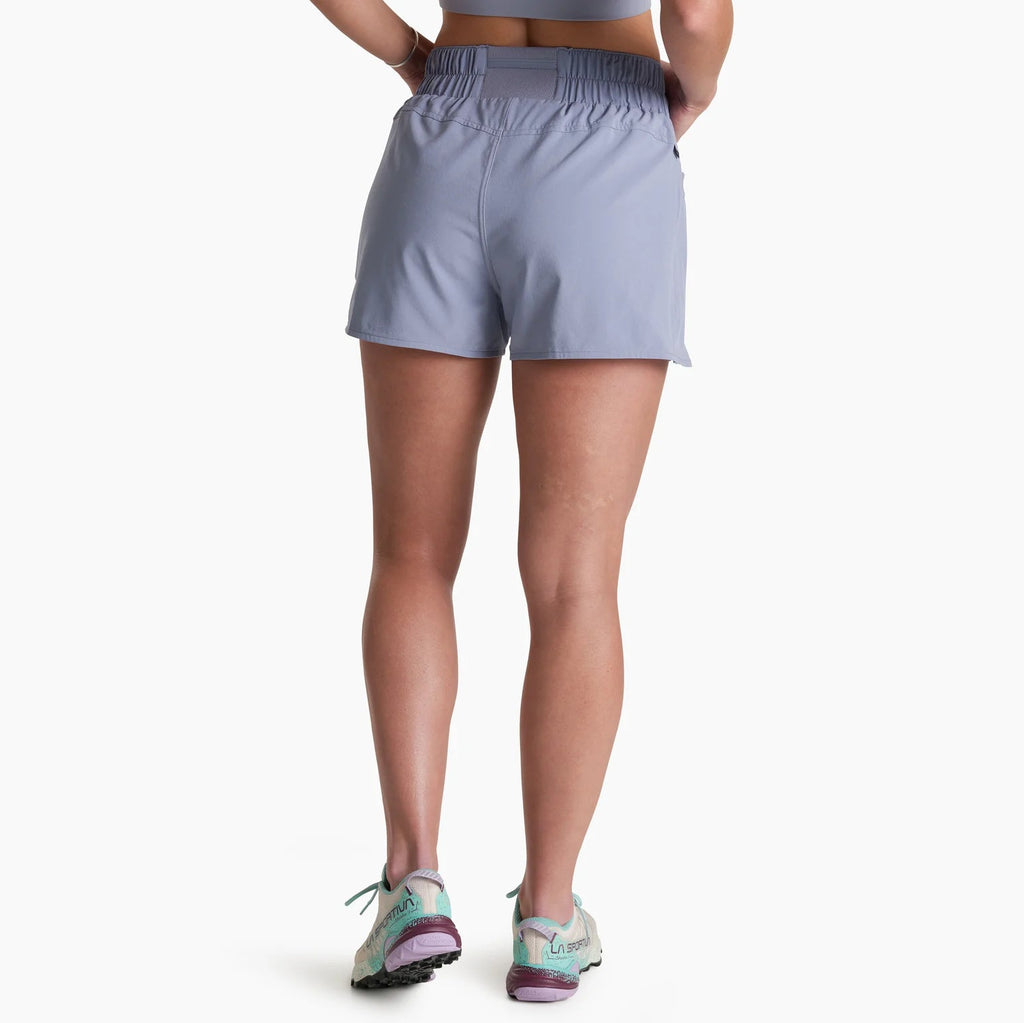 Person wearing light purple athletic shorts on a white background