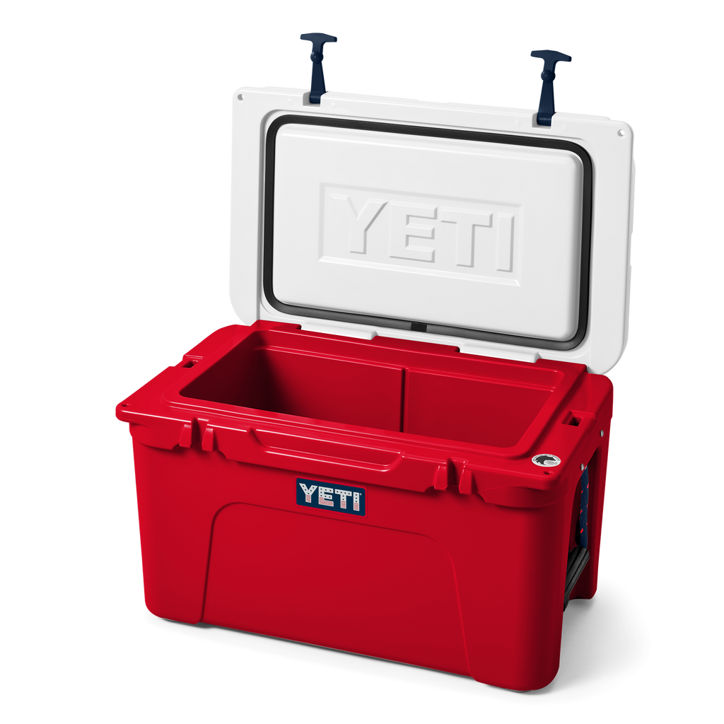 Red YETI cooler with white lid on a white background