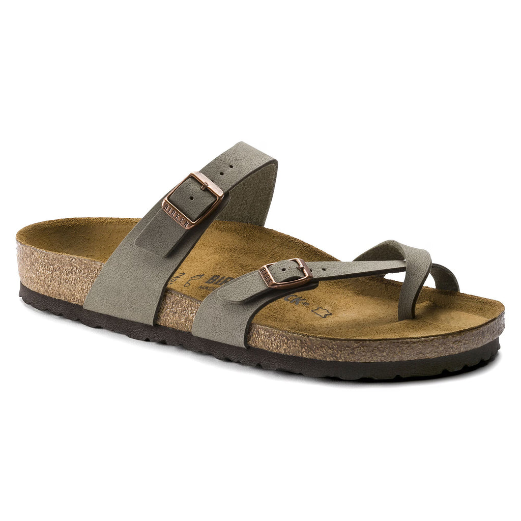 Brown sandal with cork sole on a white background