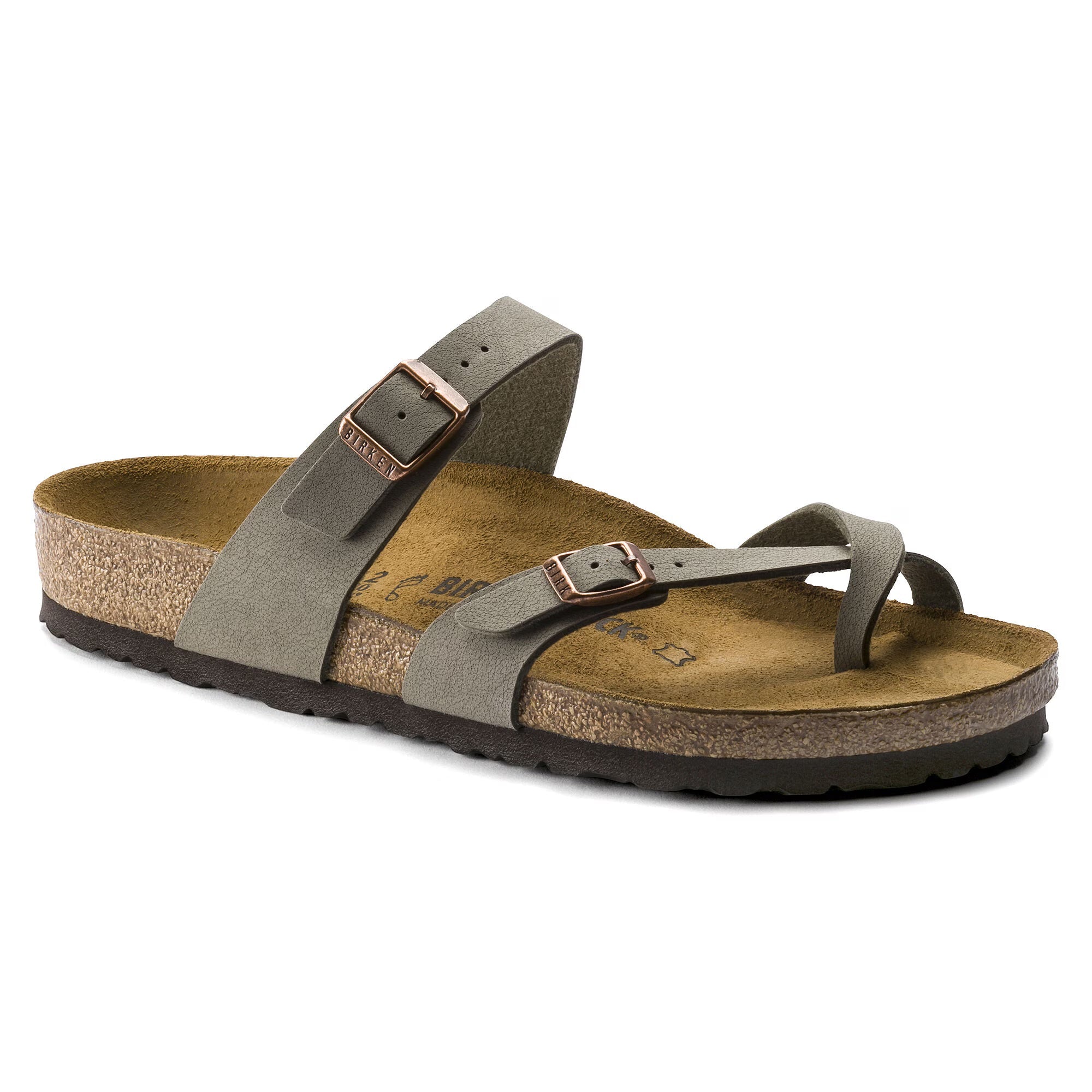 Brown sandal with cork sole on a white background