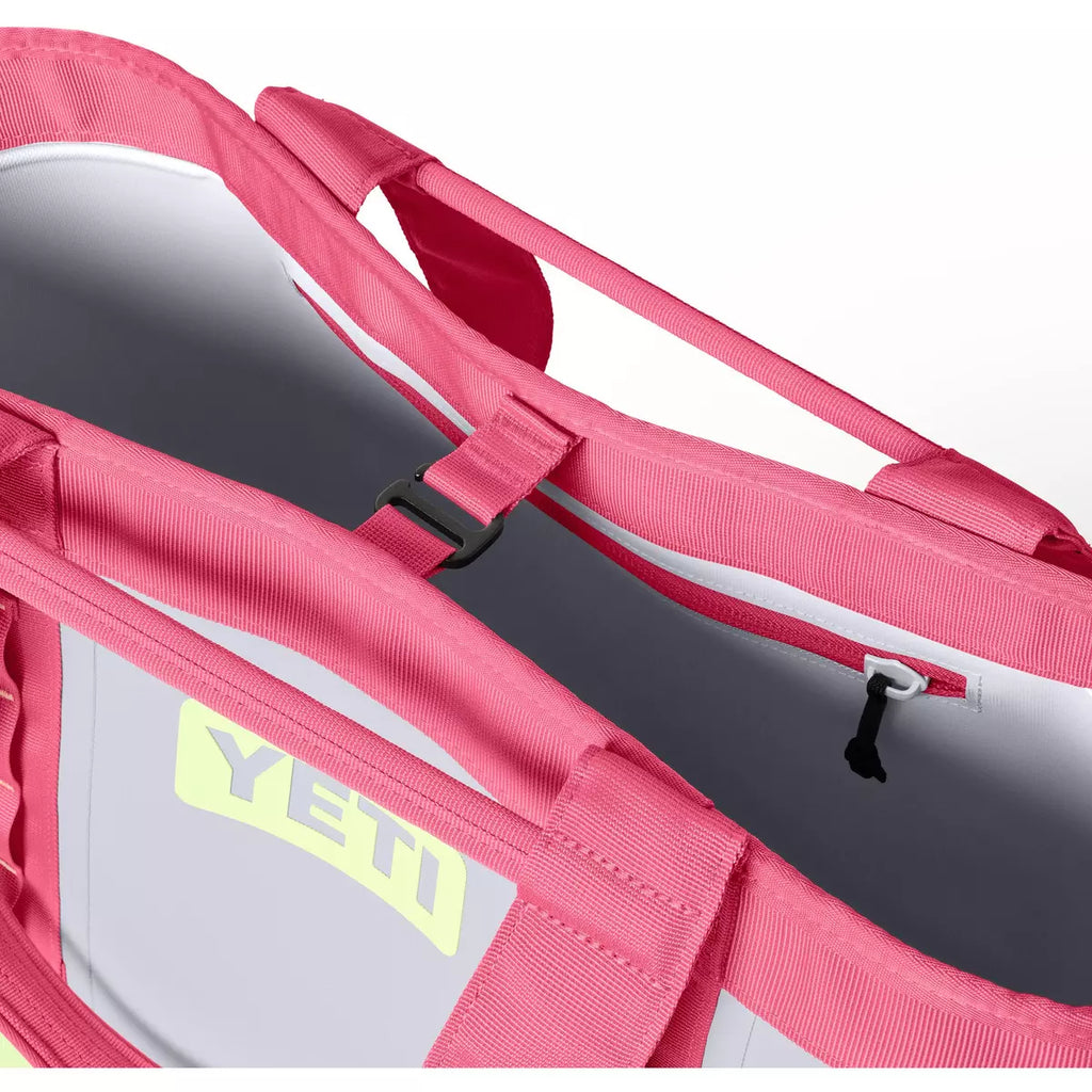 Close-up of a pink YETI cooler bag with a visible brand logo.