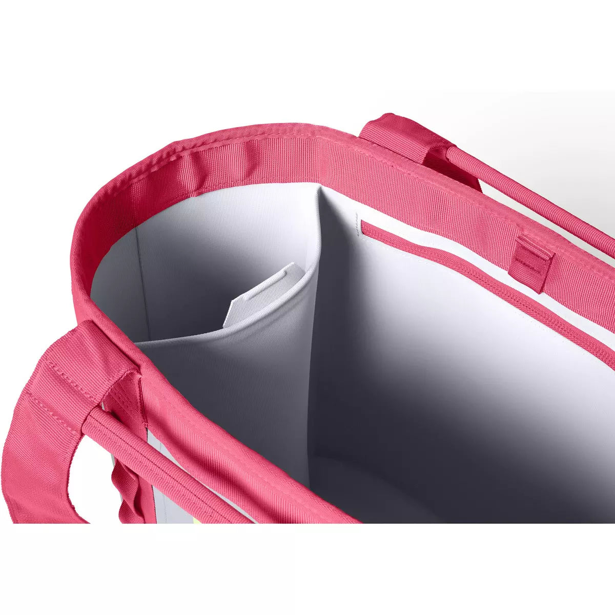 Close-up of a pink bag with a white interior on a white background