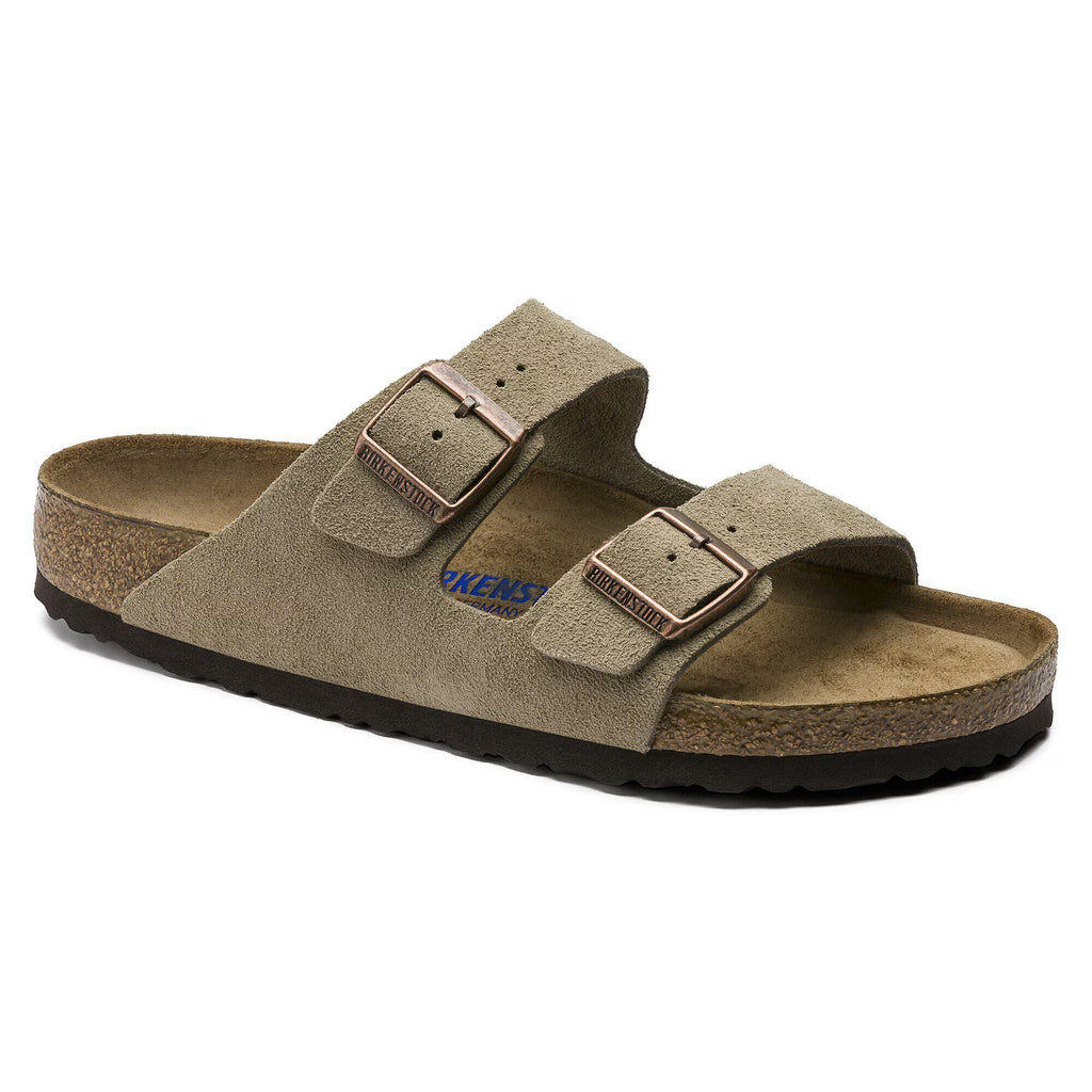 Brown sandal with a strap on a white background