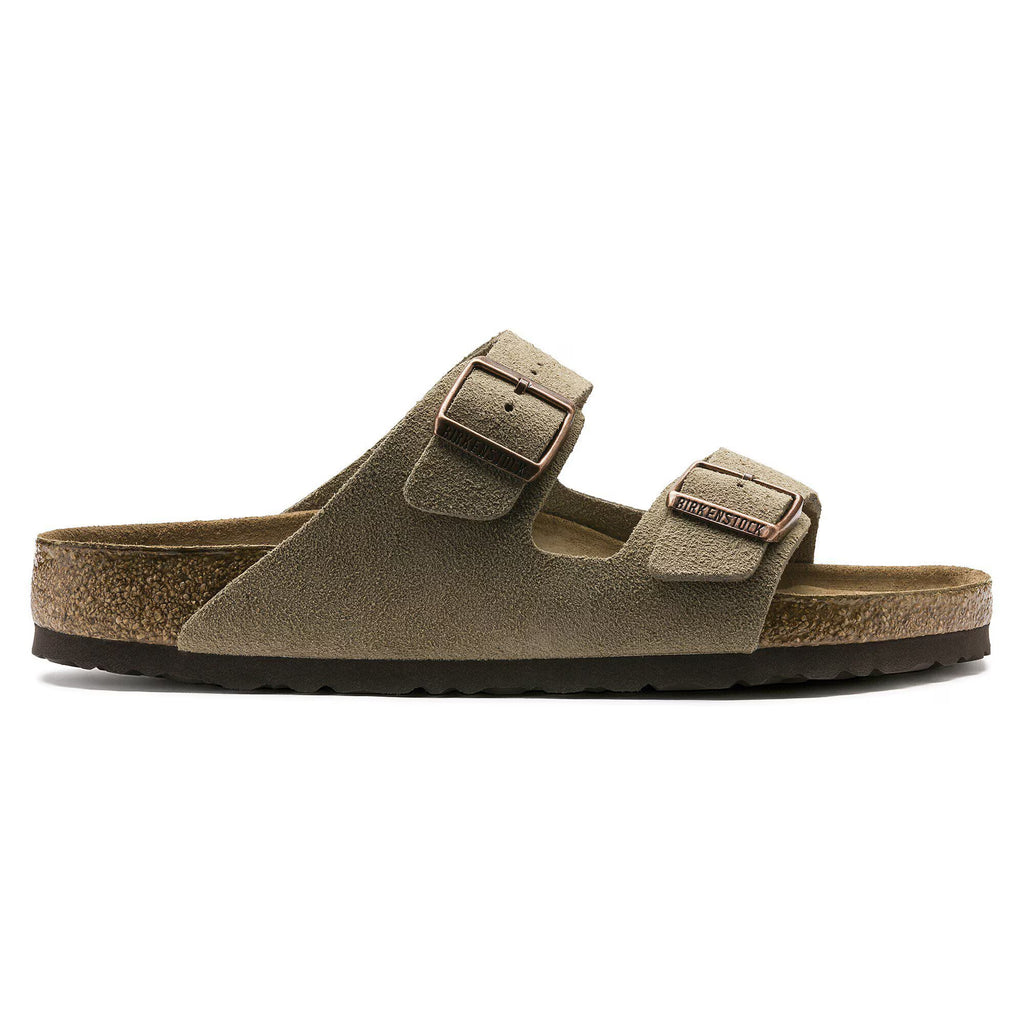 Brown sandal with double buckle on a white background