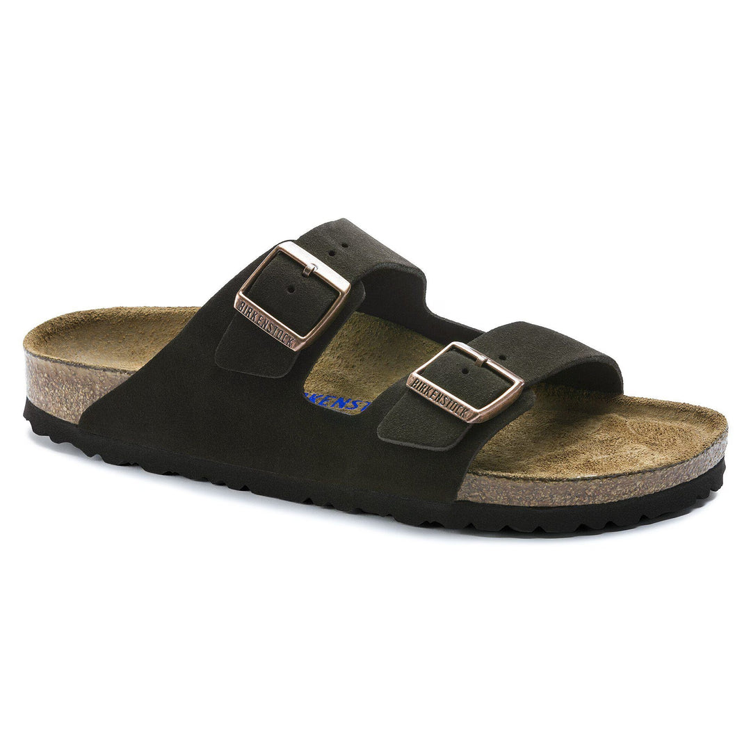 Black sandal with cork sole on a white background