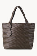 Black woven handbag with a visible brand tag on a white background