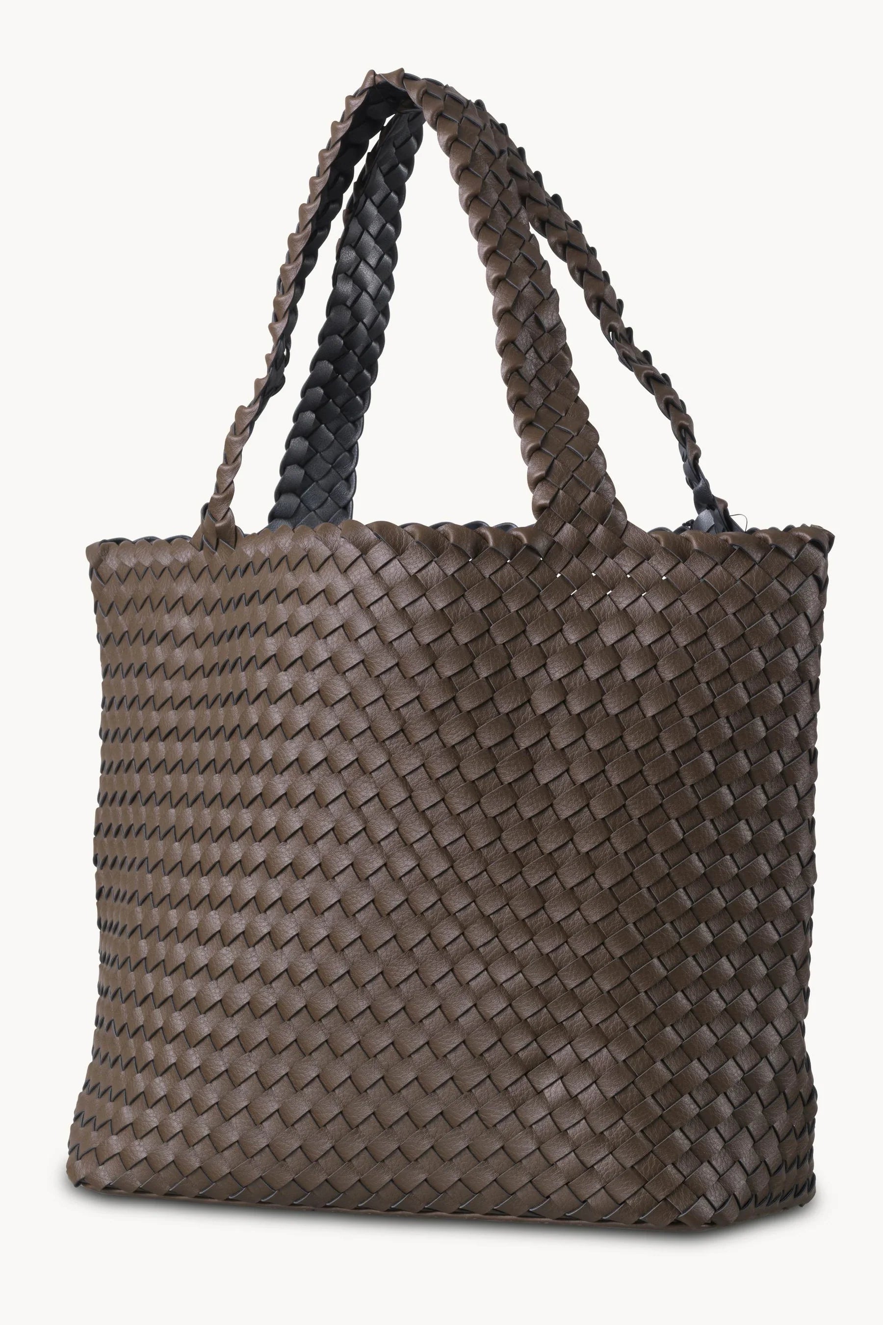 A brown woven leather tote bag with braided shoulder straps, shown against a plain off-white background.