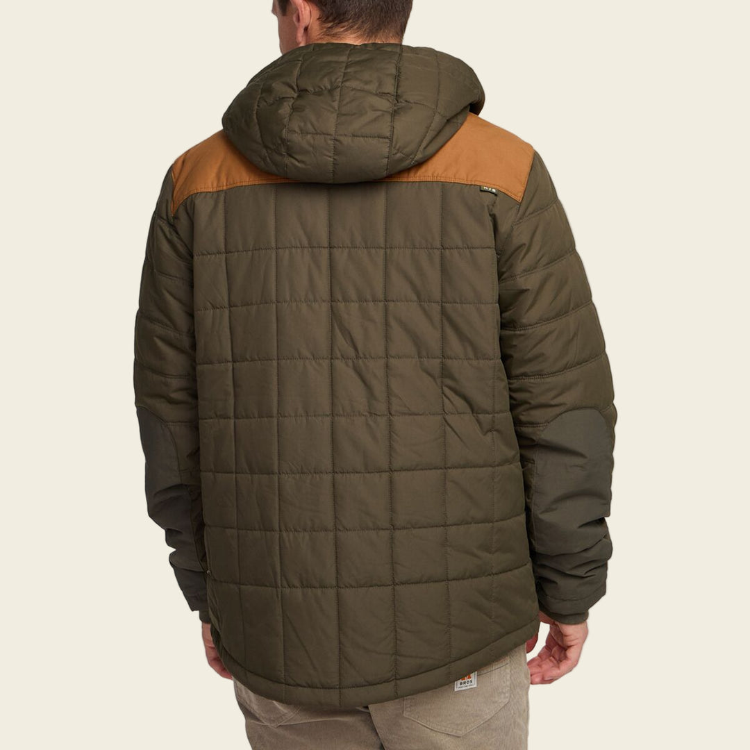 Green quilted jacket with brown hood on a white background