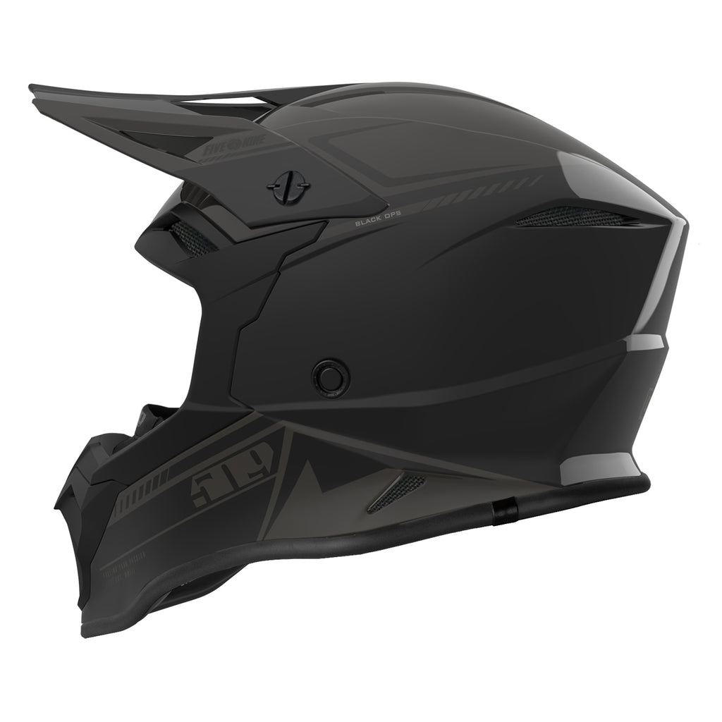 Black motocross helmet on a white background