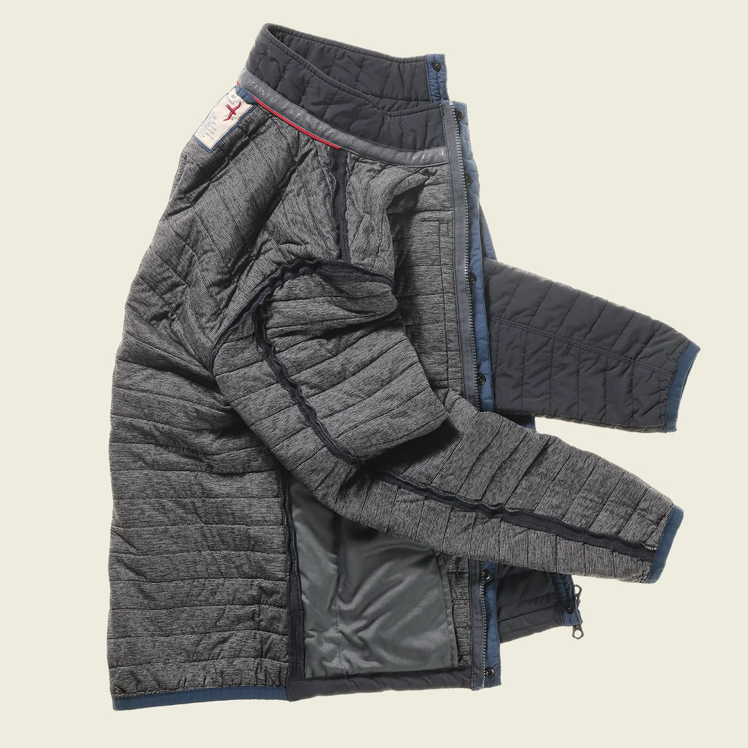 Folded gray quilted jacket on a white background