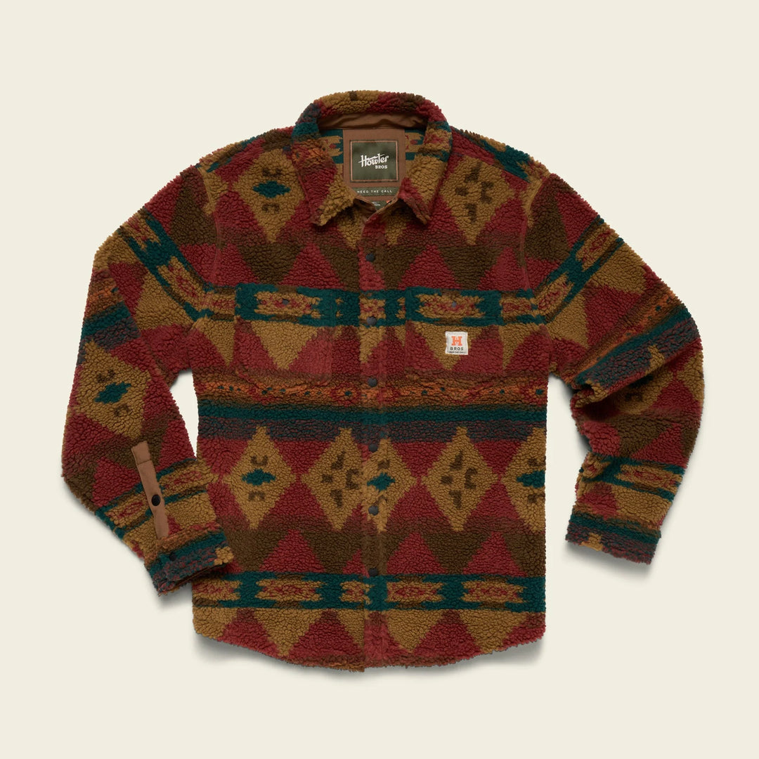 Patterned jacket with brand label on a beige background
