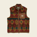 Patterned vest with brand logo on a beige background