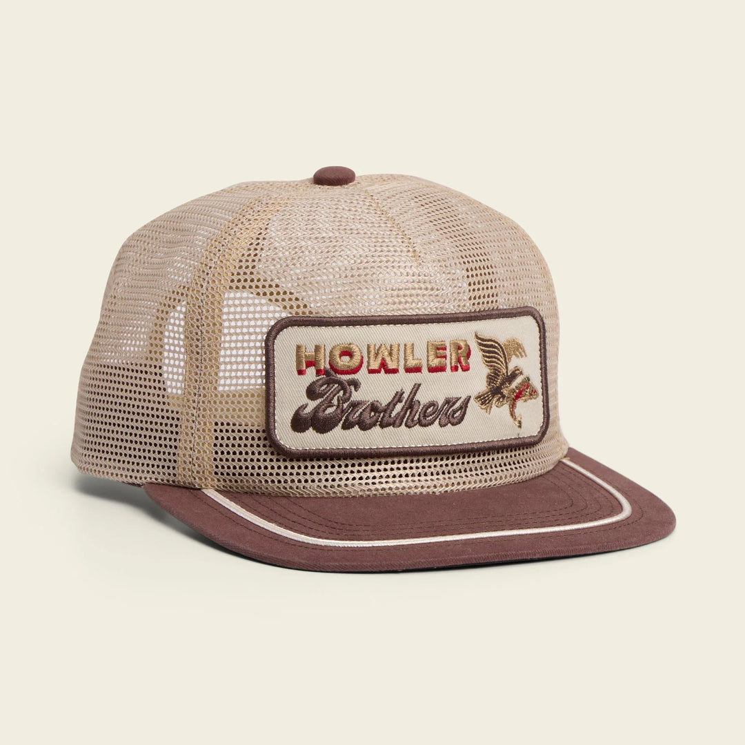 Beige and brown trucker hat with 'Howler Brothers' logo on a beige background