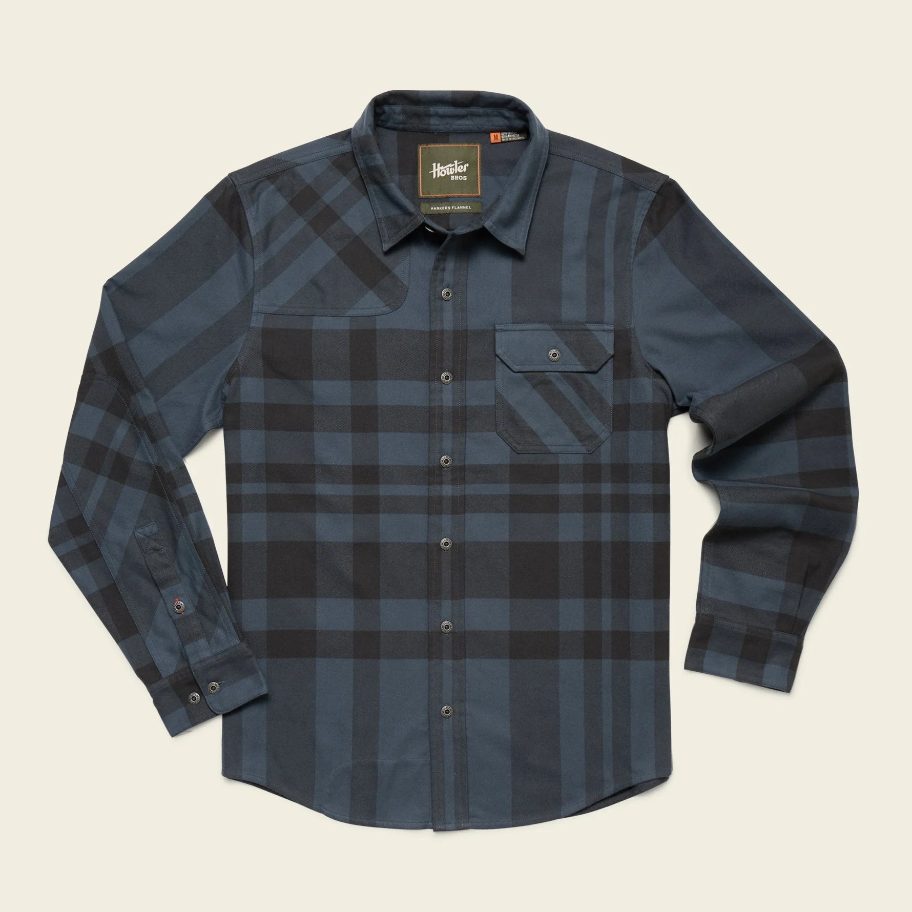 Blue plaid shirt on a beige background