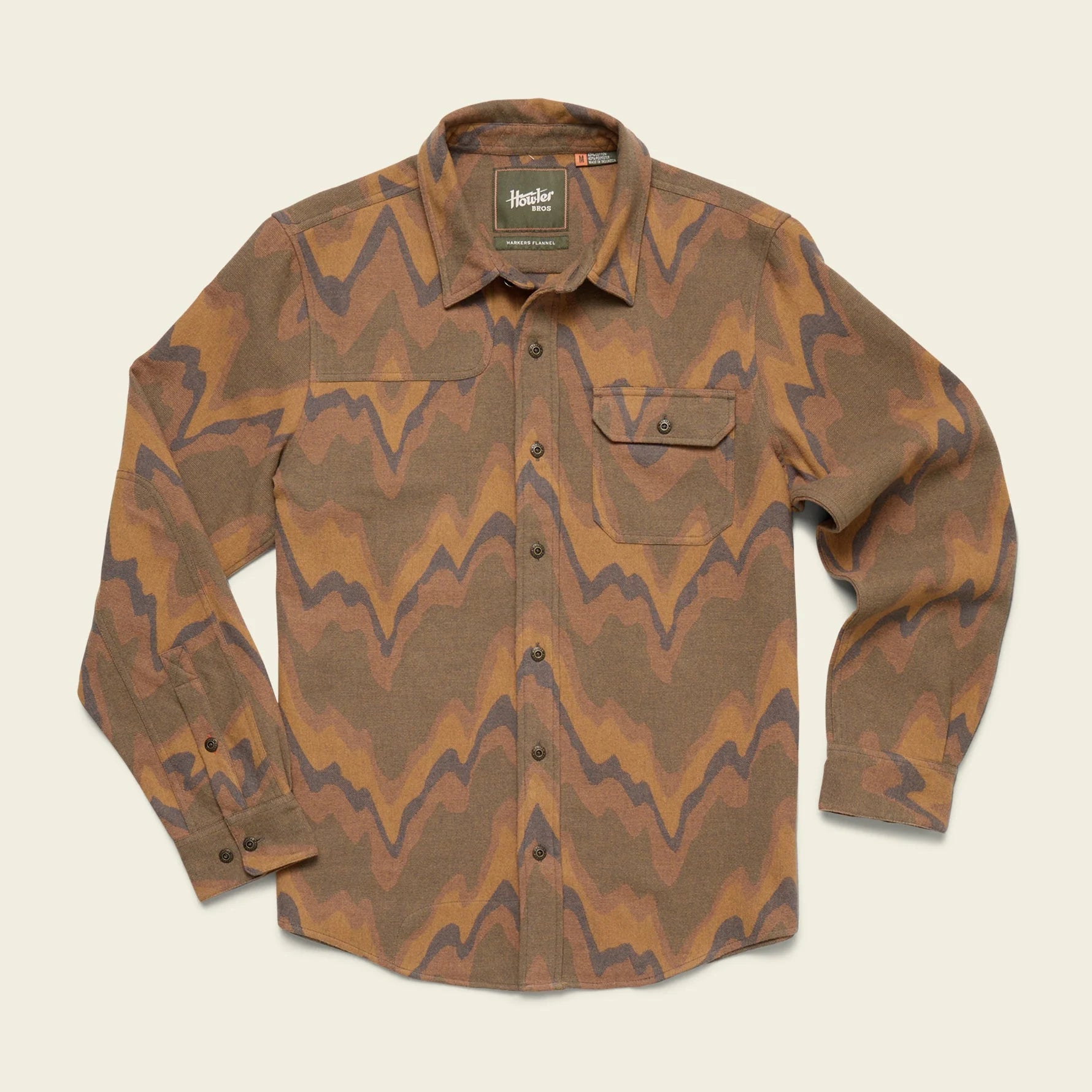 Camouflage-patterned shirt on a beige background