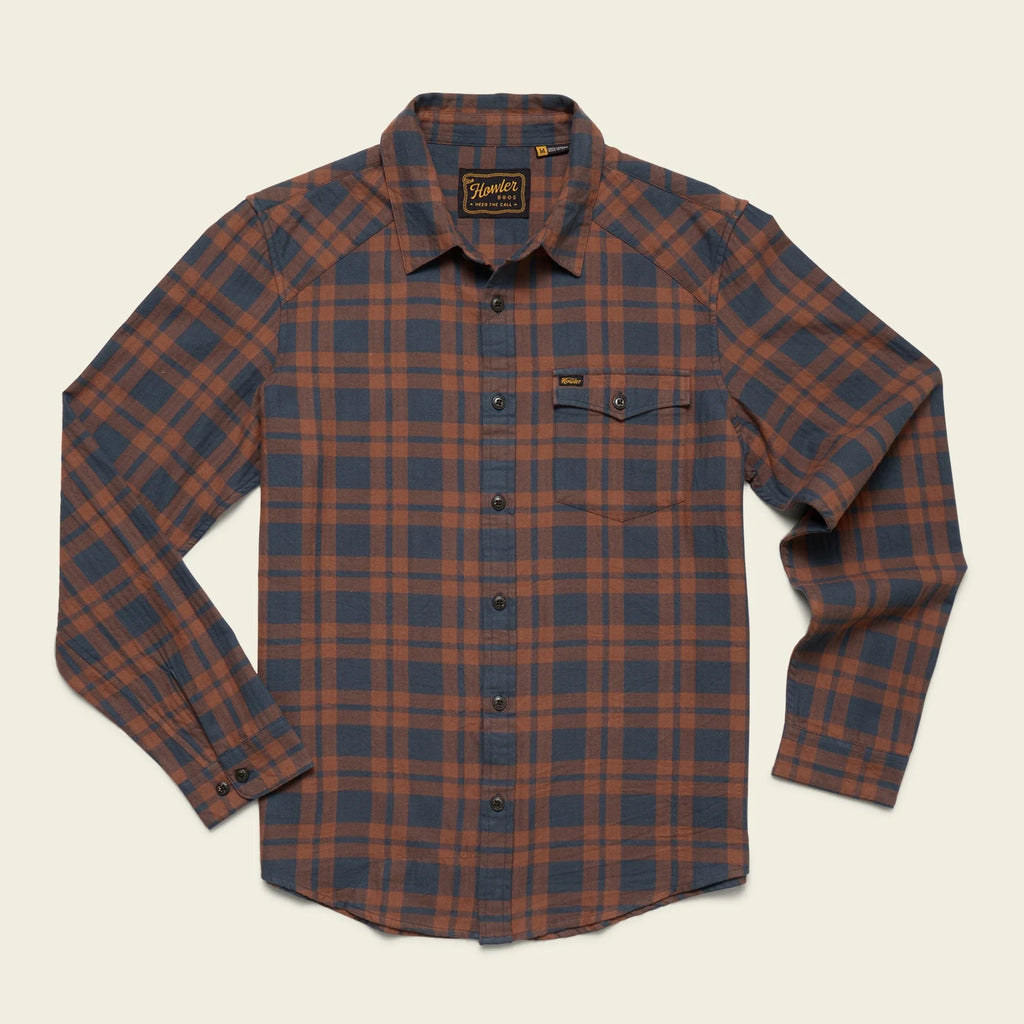 Howler Brothers plaid shirt with brown and blue pattern on a beige background