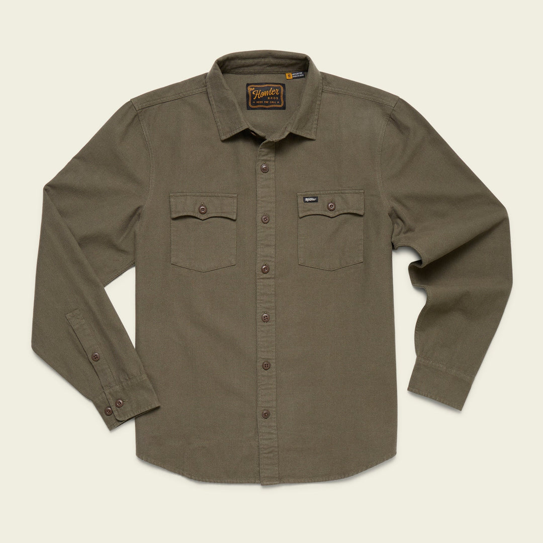 Olive green shirt with button details on a beige background