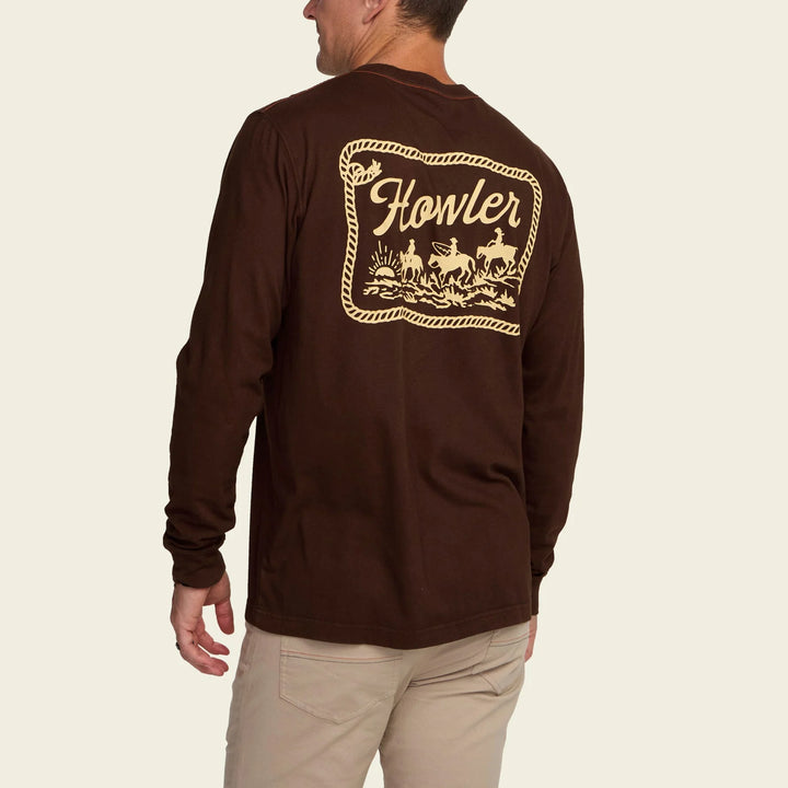 Brown long-sleeve shirt with 'Howler' logo on the back, worn by a person.