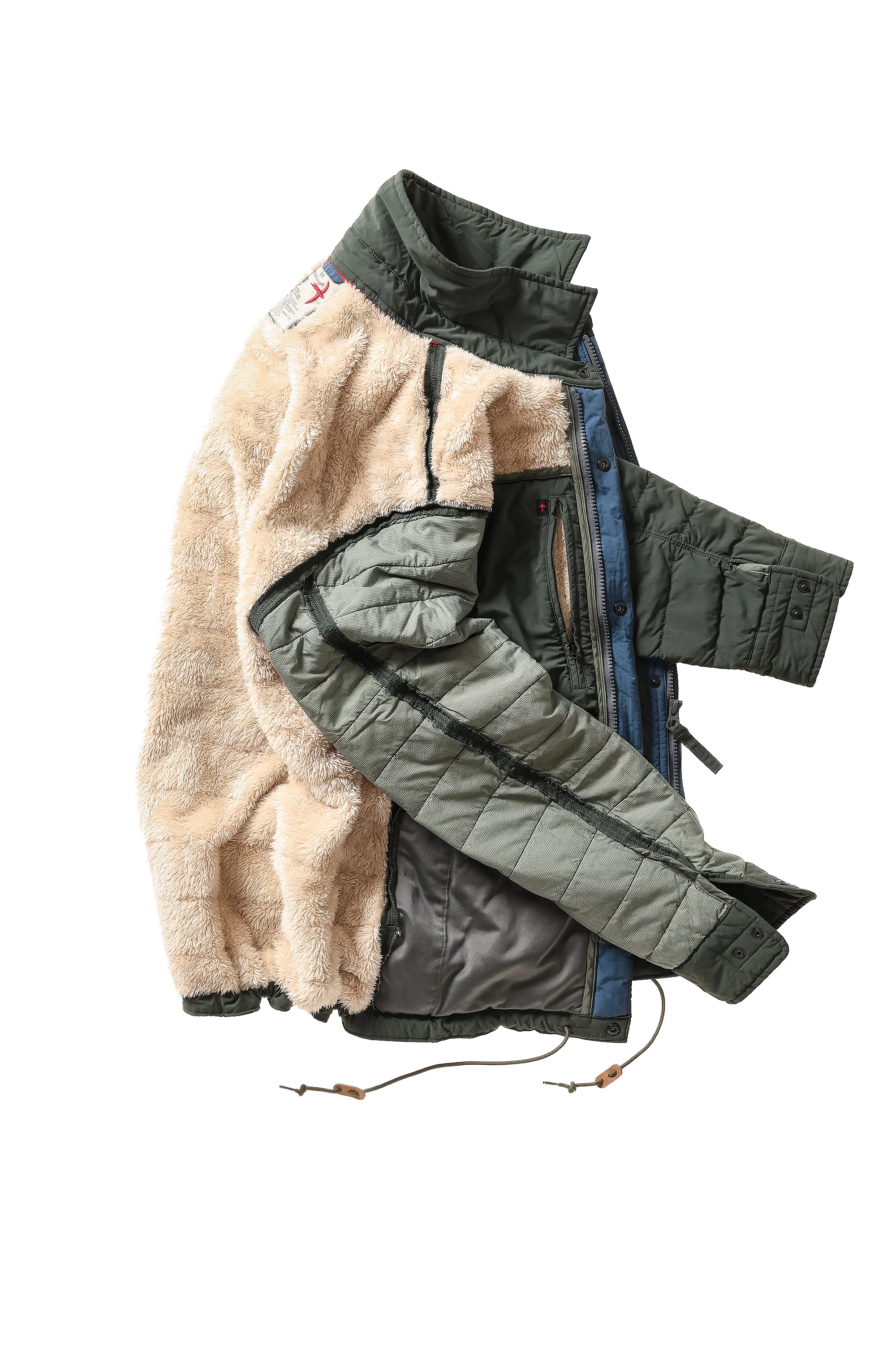 A vintage quilted jacket with a beige sherpa lining, olive green quilted outer shell, and blue lining, shown on a plain white background.