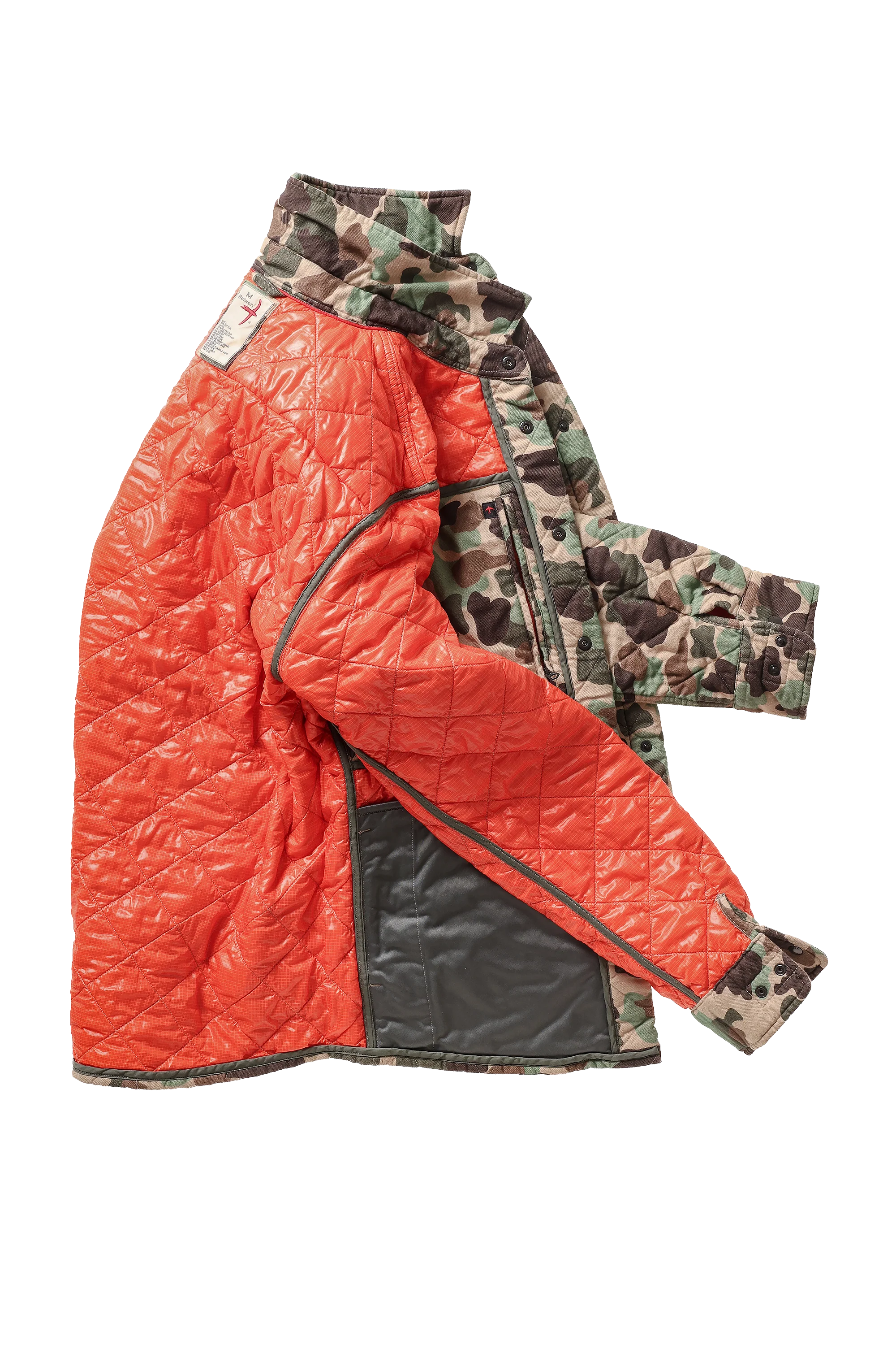 A quilted jacket with a bright orange-red front panel, camouflage patterned sleeves and collar, and a black zippered pocket on the lower front, shown on a plain white background.
