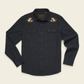 A dark charcoal gray long-sleeve button-up shirt with embroidered western-style bird motifs on the shoulders, displayed flat against a light cream background.