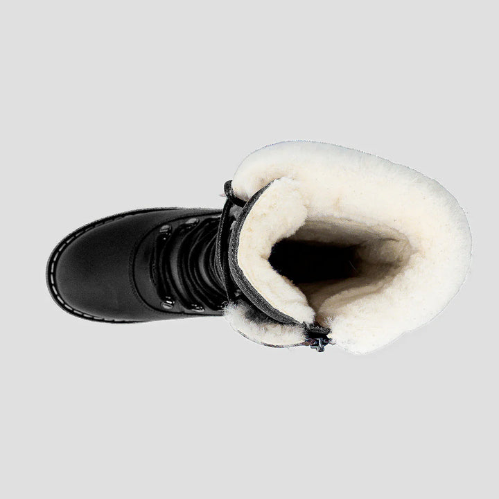 Black boot with white fur lining on a light gray background