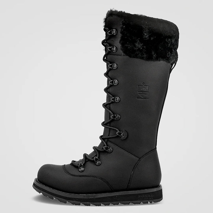 Black winter boot with fur lining on a light gray background