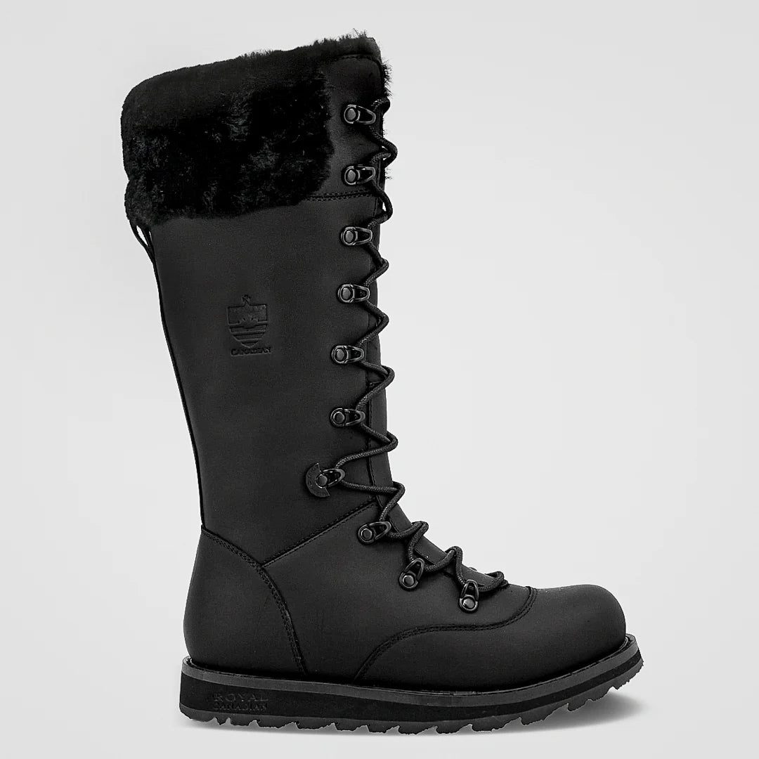 Black winter boot with fur lining on a light gray background