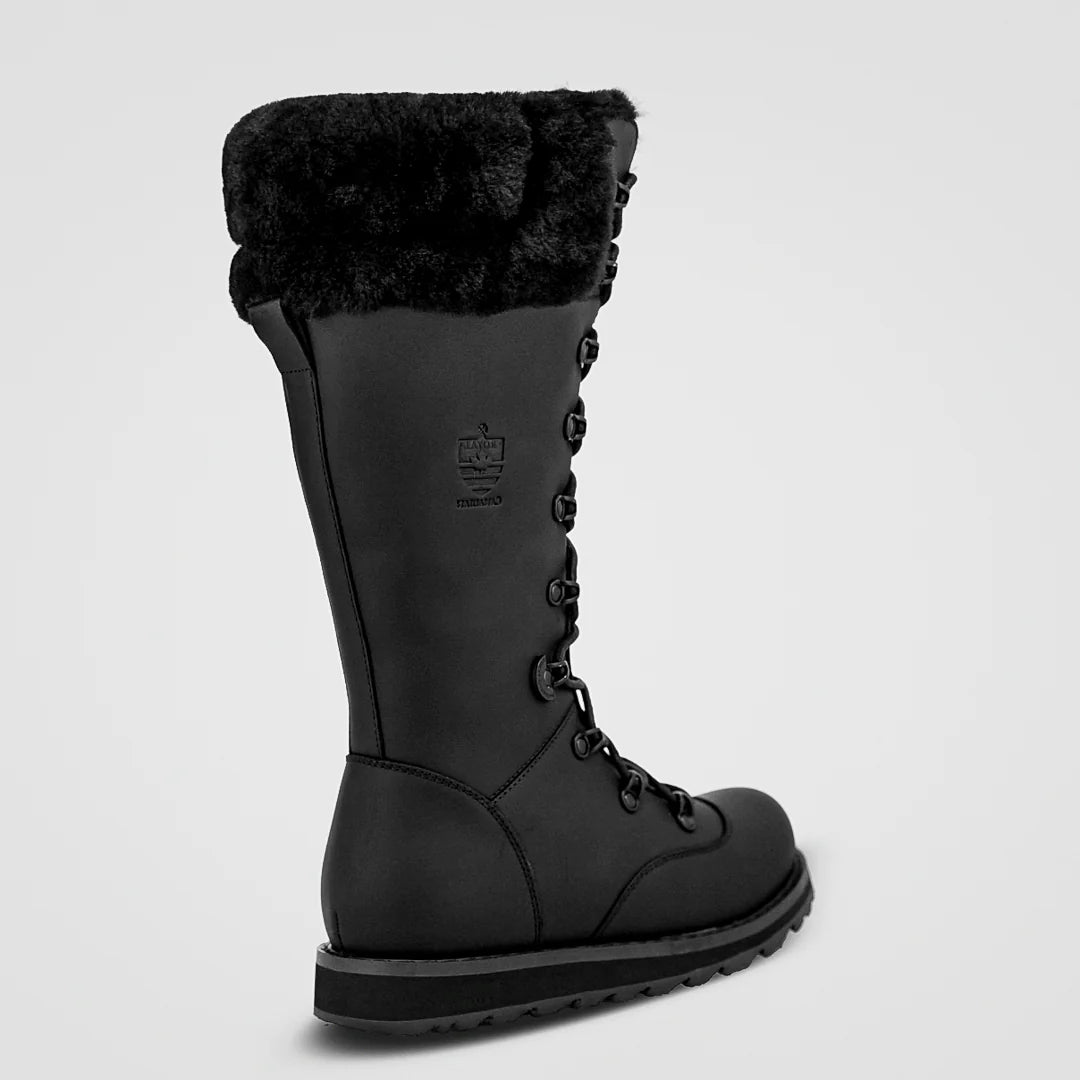 Black winter boot with fur lining on a light gray background