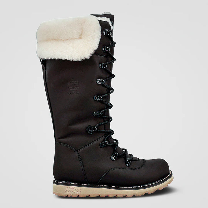 Black winter boot with white fur lining on a light gray background