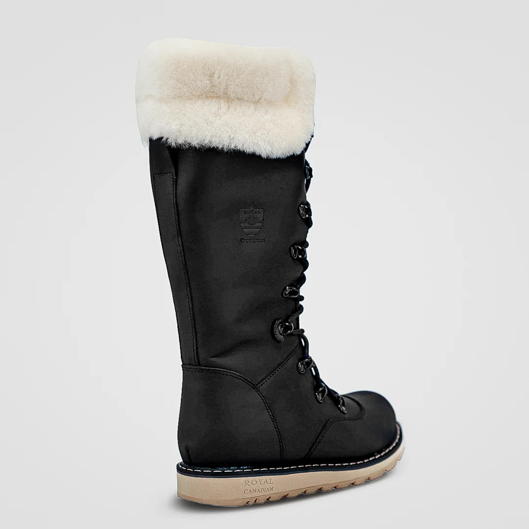 Black winter boot with white fur lining on a light gray background