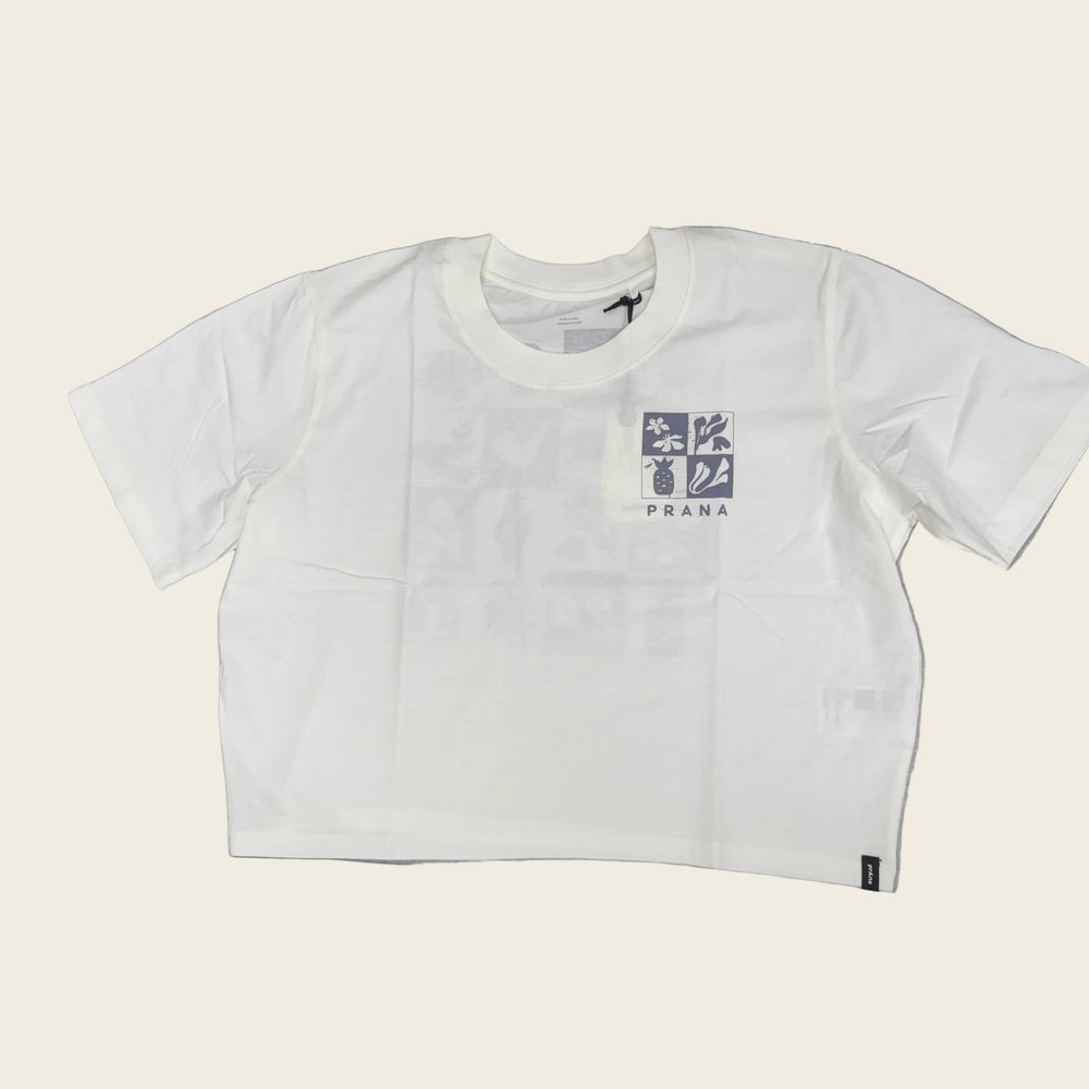 White t-shirt with black text on a gray surface 