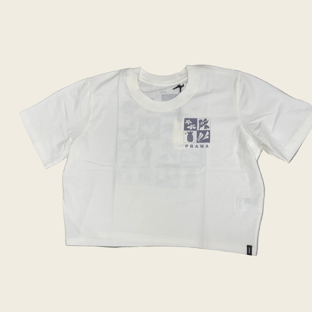 White t-shirt with black text on a gray surface 