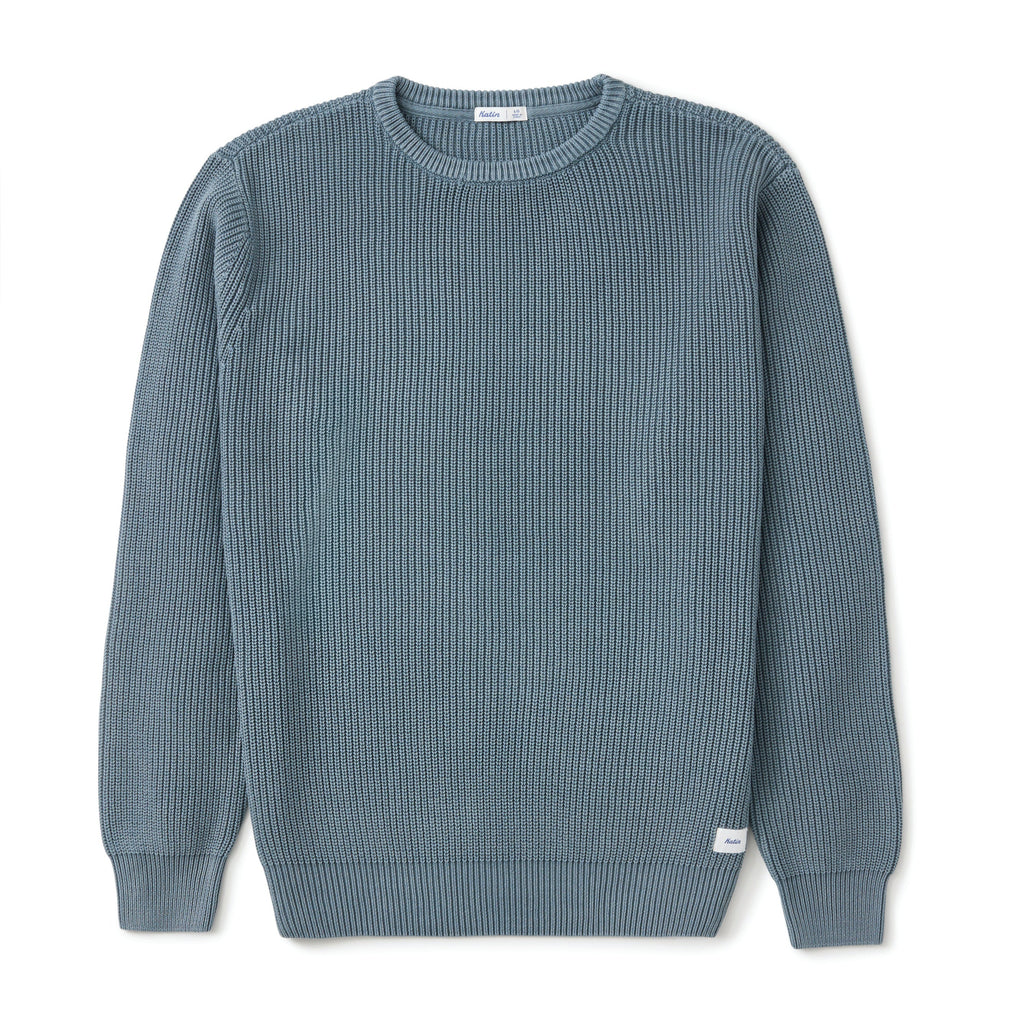 A ribbed knit crewneck sweater in a muted slate blue color, displayed flat against a clean white background.