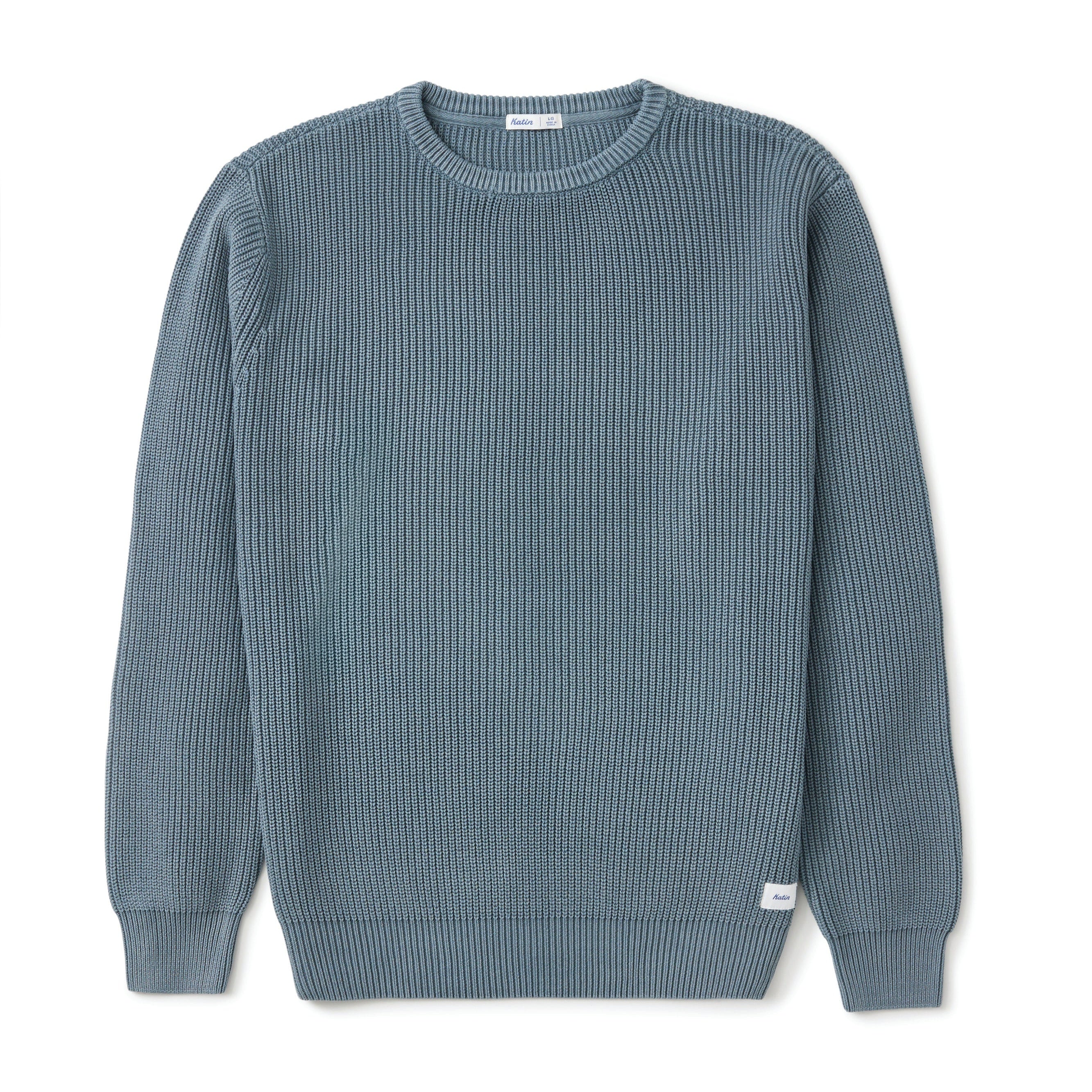 A ribbed knit crewneck sweater in a muted slate blue color, displayed flat against a clean white background.