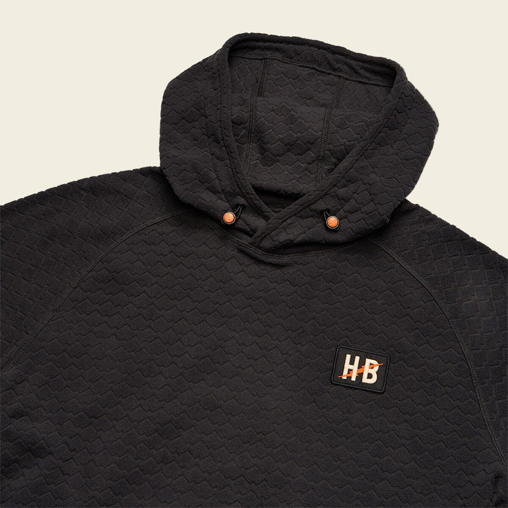 Black quilted jacket with a brand logo on a white background