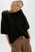 Free People Margot SoftSpun Sweater Tee in Black -front view of shirt on model 
