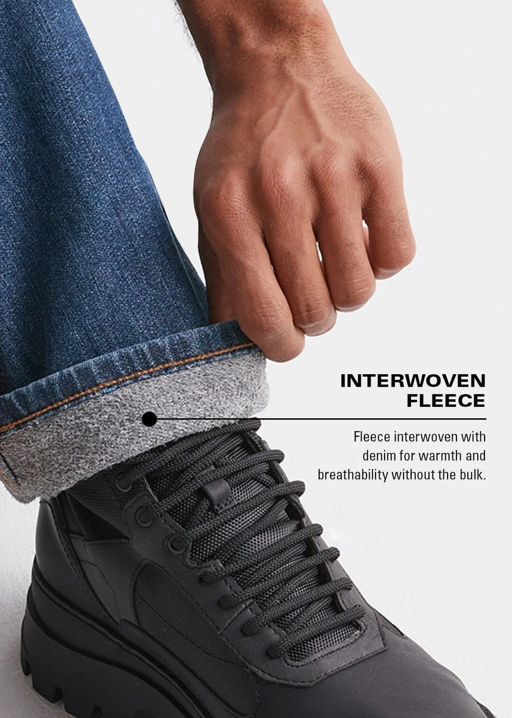 Person wearing black boots with interwoven fleece and denim, highlighting warmth and breathability.