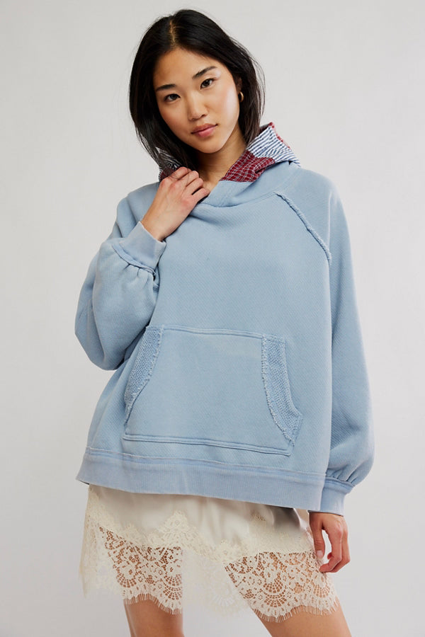 Free People Countryside Hoodie in Autumn Sky on model wearing a lace skirt with white background
