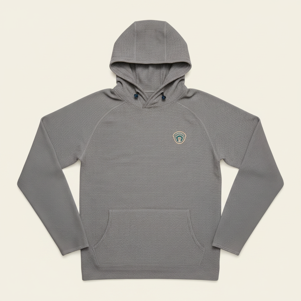 A heather gray long-sleeve hooded sweatshirt with a kangaroo pocket and a small circular embroidered logo on the left chest, displayed flat against a white background.
