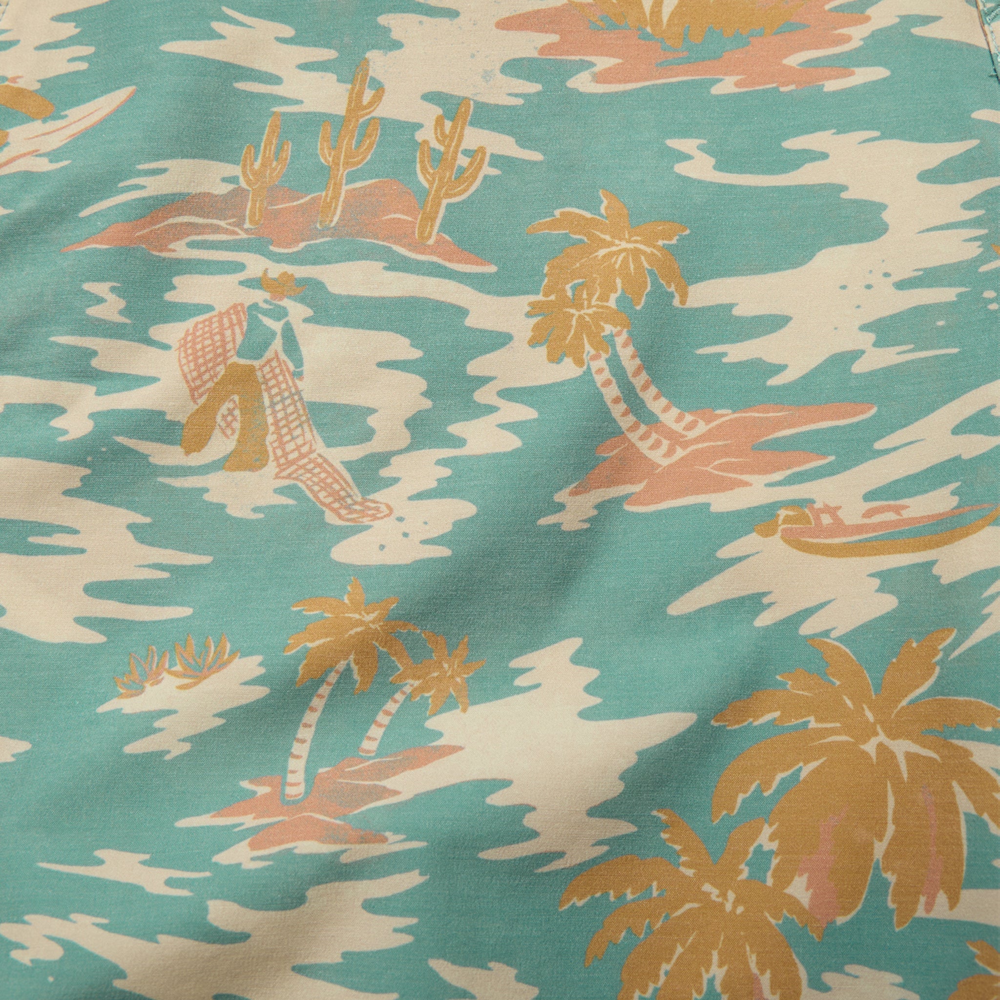Fabric with a tropical pattern featuring palm trees, beach chairs, and boats on a teal background.