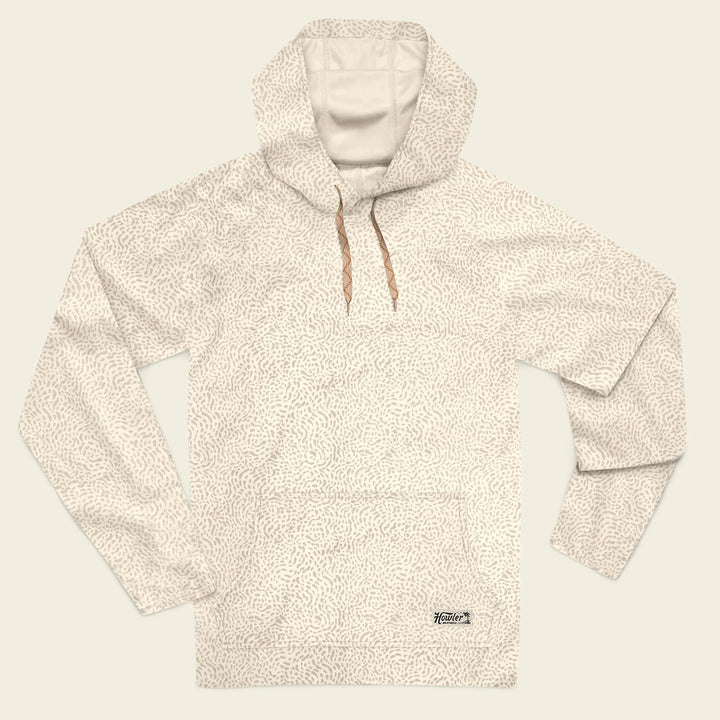 Beige fleece pullover with a pattern on a beige background