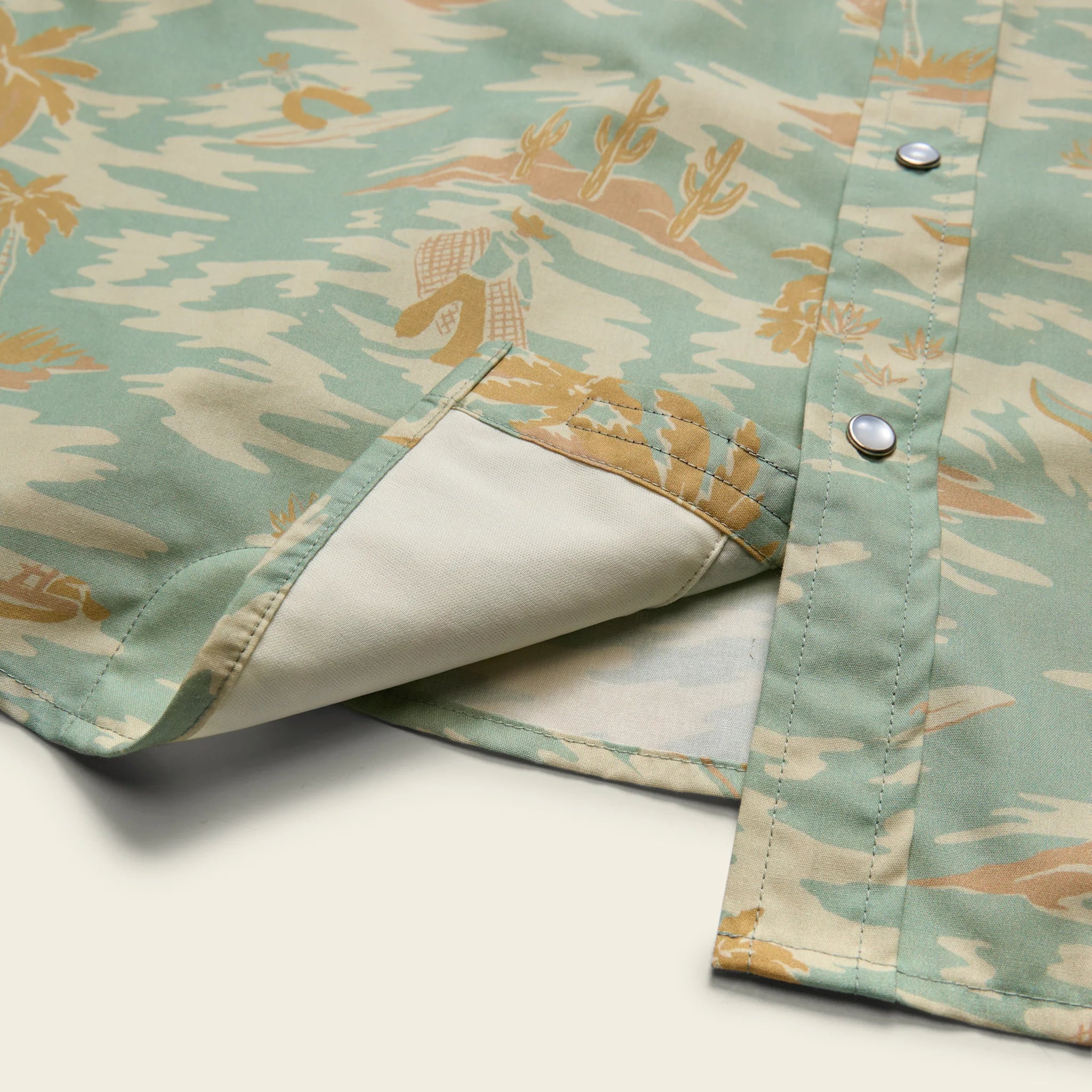 Folded shirt with a camouflage pattern on a light background
