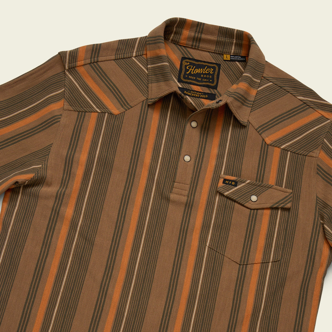 Brown and orange striped shirt with a visible brand label on a beige background