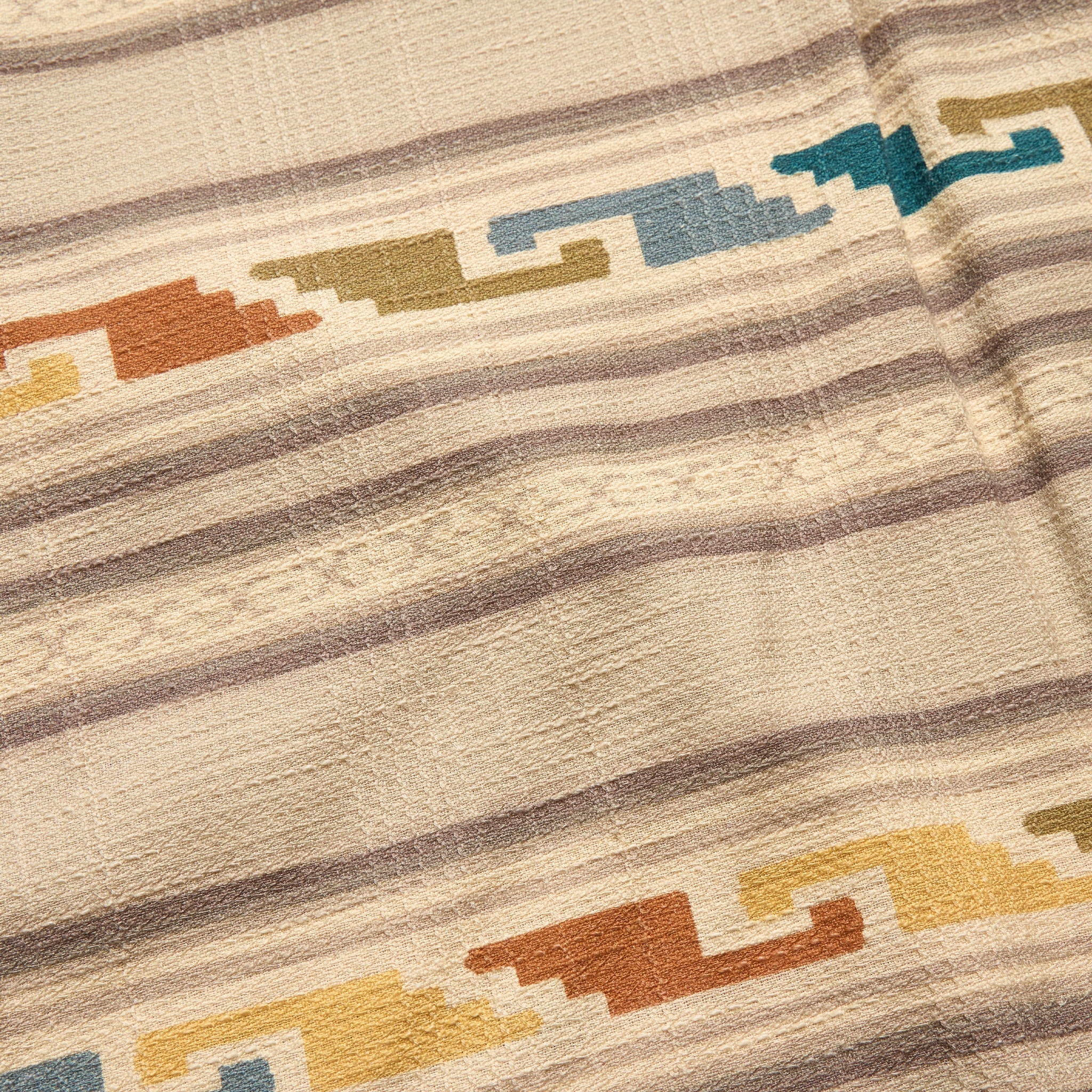 Close-up of a textured fabric with geometric pattern