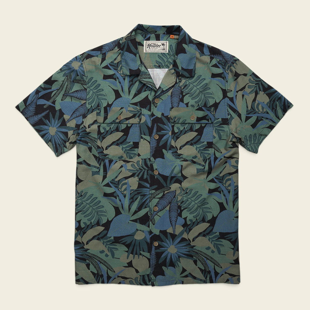 Short-sleeve shirt with tropical leaf pattern on a beige background
